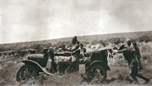 Scrub Prints: Indian driver and vehicle in desert, Middle East
