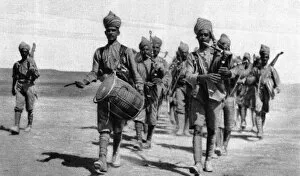Drumming Collection: Indian infantry marching out from camp in Mesopotamia