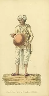 Indian musician with khol drum