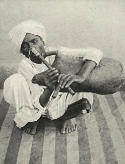 Apr16 Collection: Indian musician plays noseflute and bagpipes simultaneously