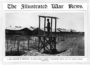 Enclosed Prints: Indian soldier stands guard during World War I