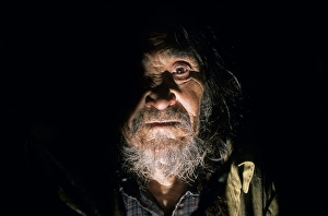 Indoor portrait of Siberian shaman / sorcerer /