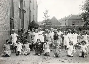 Infant Primary School, England - Schoolgirls in the garden