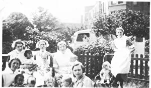 Nursing Collection: Informal outdoor group of nurses and children