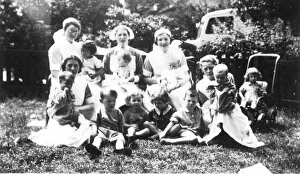 New Images July 2020 Gallery: Informal outdoor group of nurses and children