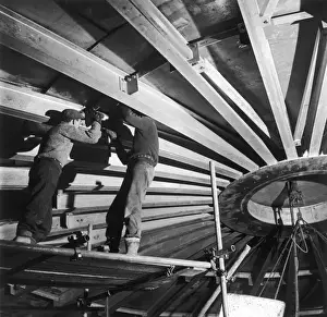 Methane Prints: Installation of the roof for a liquid methane tank