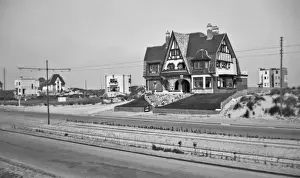 Lanes Prints: Interesting houses by a dual carriageway