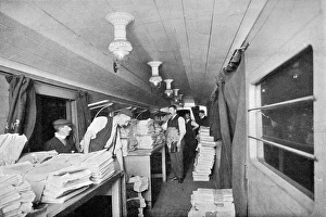 Interior of a sorting car on a newspaper express train Interior of a sorting car on a newspaper express train