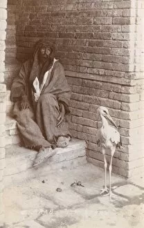 Images Dated 7th March 2011: Iraq - Iraqi Man with a stork - Baghdad