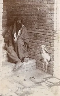 Stork Prints: Iraq - Iraqi Man with a stork - Baghdad