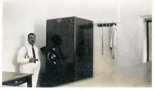 Braces Prints: Iraqi bank official with a large safe, Iraq