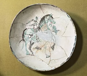 Andalusia Collection: Islamic pottery. Taifor. Plate decorated with horse. Ceramic