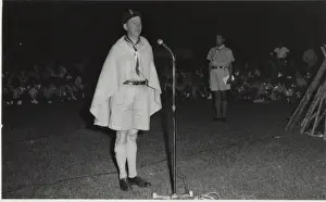 Commissioner Prints: Island Commissioner speaking at campfire event, Mauritius