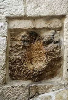 Painful Gallery: Israel. Jerusalem. Via Dolorosa. V Station. Stone with the p