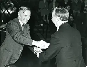 J. W. Barnes, left, is presented with his Royal Aeronauti?
