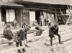 Japan: carpenters at work with chisel and axe
