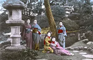 Courtesans Prints: Japan - Five Geisha pose for the photographer in a garden