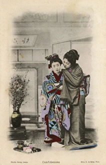 Confidence Gallery: Japan - A Geisha whispers a secret to another fellow Geisha