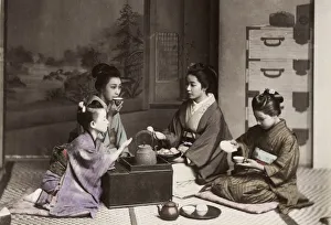 Indoors Prints: Japan: girls drinking tea with a kettle and stove