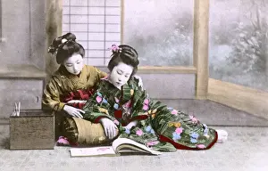 Reads Prints: Japan - Two Japanese girls in traditional costume reading