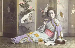 Geisha Prints: Japan - Reclining Geisha girl smoking