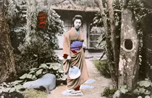 Stepping Prints: Japan - Woman ( boss at the tea house !) in garden with fan