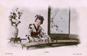 Koto Prints: Japan - Woman in a kimono playing a traditional Koto