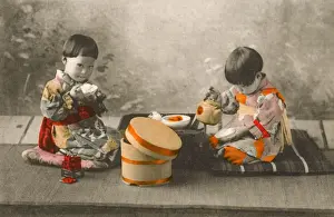 Rice Prints: Japan - Two young Children eating rice and drinking tea