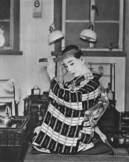 Kabuki Prints: A Japanese actor dresses