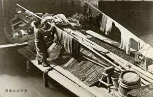 Tokyo Prints: Japanese barge-dweller hanging out her laundry