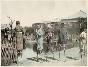 Bamboo Prints: Japanese boys playing on bamboo stilts (bamboo horse) Date: circa 1890s