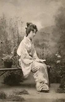 Hairdo Prints: Japanese Geisha seated on a bench