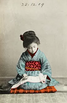 Kimono Gallery: Japanese girl practising calligraphy