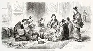 Kimono Prints: Japanese people sitting on the floor eating their meal using small bowls and chopsticks