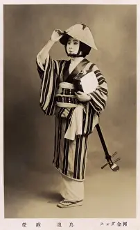 Make Up Prints: Japanese theatrical performer holding a Shamisen