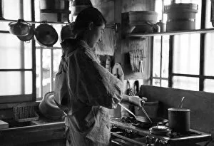 Images Dated 31st August 2011: Japanese Woman Cooking