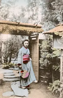 Stepping Prints: Japanese woman at the entrance to her garden