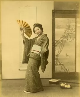 Japanese Prints Collection: Japanese woman in kimono with fan