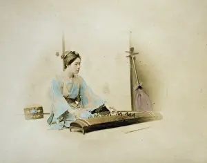 Koto Prints: Japanese woman, full length, seated, facing right, playing a