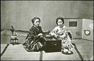 Geishas Prints: Two Japanese women drinking tea