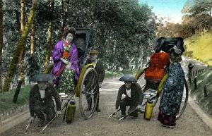 Rickshaws Prints: Two Japanese women get into their rickshaws
