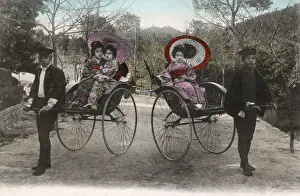 Rickshaws Prints: Japanese women transported by rickshaw