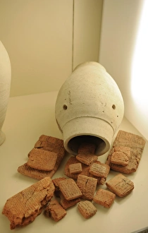 Cuneiform Gallery: Jar containing clay tablets written in cuneiform. 8th centur
