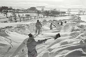Helmsley Prints: John (at front) clearing the snow in Yorkshire as part of the community work that is done by Polish Forces staying