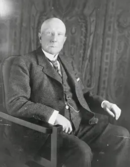 John D. Rockefeller, three-quarter length portrait, seated