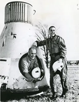 John Glenn and Virgil Grissom pose beside Mercury spacecraft John Glenn and Virgil Grissom pose beside Mercury spacecraft