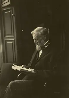 Muir Prints: John Muir, seated, reading a book