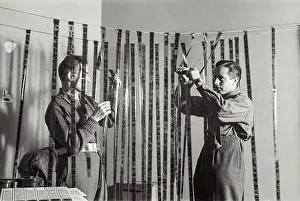 Examining Prints: John (on right) at the Polish Resettlement camp in Helmsley, Yorkshire