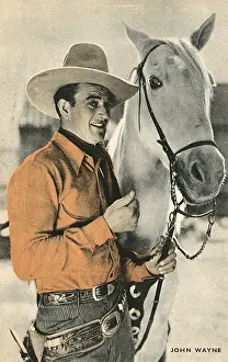 Films Prints: John Wayne, American film star, with horse