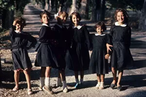 Images Dated 27th August 2019: Six jolly little schoolgirls pose for the camera, Antalya